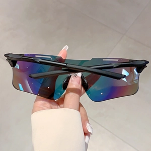 Detail of outdoor sports sunglasses with large colorful coated lens and matte black frame