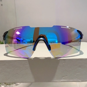 Close-up of polarized colorful mirror lens on black frame cycling sunglasses