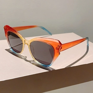Detailed side view of cat-eye sunglasses with colorful four-color gradient frame