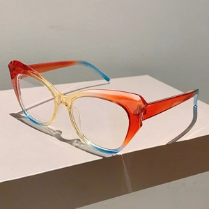 Detailed macro view of cat eye frame with vibrant red yellow and blue gradient colors