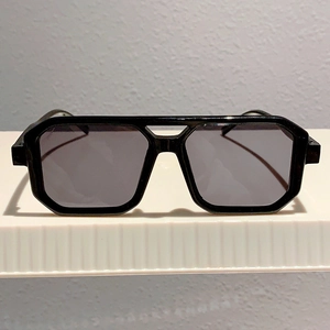 Front view of black square frame sunglasses with trendy double bridge and dark grey lenses