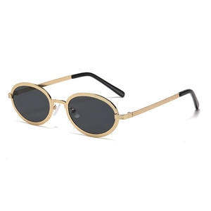 Retro oval sunglasses with textured gold metal frame and dark lenses shown in 45-degree view
