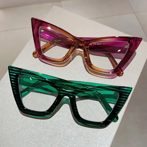 Chic cat-eye anti-blue light glasses with gradient and striped frames on display stand