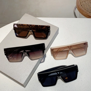 Oversized square sunglasses with rivets in tortoiseshell, black and transparent tea colors