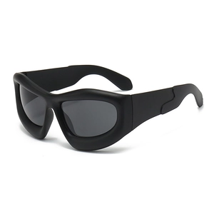 Y2K futuristic matte black bubble sunglasses with thick frame shown at a 45-degree angle
