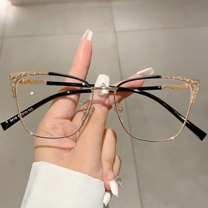 Lunettes anti-lumière bleue œil de chat pour femmes avec monture dorée noire et strass