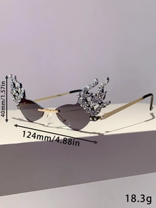Detail showing dimensions of gray flame-shaped rimless sunglasses with silver rhinestones