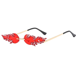 Fashionable flame shaped sunglasses with red lenses and silver crystal embellishments