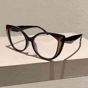 Detail of cat-eye eyewear showing stylish leopard print stitching and transparent lenses