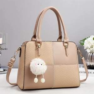 Minimalist beige large capacity tote bag with diamond knit pattern and plush charm
