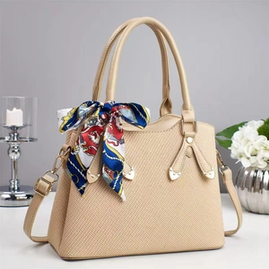 Elegant beige woven textured handbag for women with colorful silk scarf and gold hardware