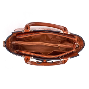 Top view of brown faux crocodile handbag showing three spacious inner compartments