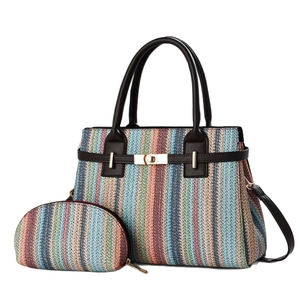 Fashionable rainbow woven tote bag set with brown handles and a small matching purse
