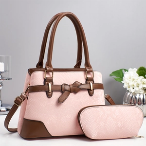 Pink snakeskin pattern handbag set with brown trim and bow decoration for women