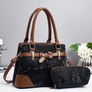 Black snake pattern large tote and small pouch set with brown leather bow and strap