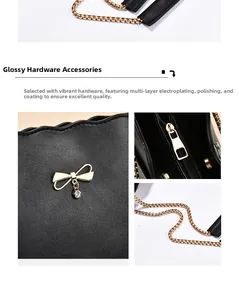 Detailed view of glossy golden bow hardware and polished chain strap on black bag