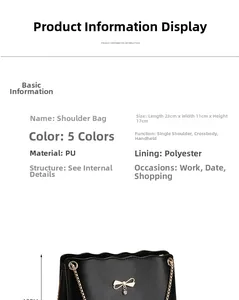 Detail view of the black PU shoulder bag showing dimensions 23x11x17cm and golden bow charm