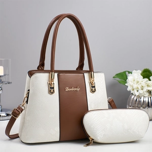Women's cream and brown faux snakeskin tote set with adjustable shoulder strap