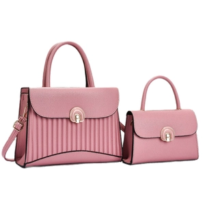 Pink lychee textured leather handbag set with rainbow gold buckle and shoulder strap