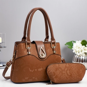 Brown snakeskin texture handbag set with elegant gold hardware and matching pouch