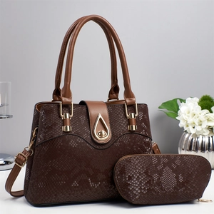 Dark brown snake-patterned handbag set with elegant gold teardrop hardware and strap