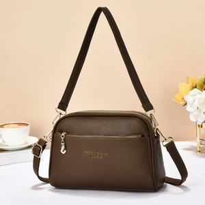 Dark brown faux leather crossbody bag with double zippers and gold lettering for women