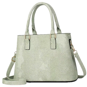 Chic mint green canvas tote bag with top handles and adjustable shoulder strap for women