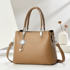 Brown lychee leather tote bag with dual handles and detachable strap for daily commute