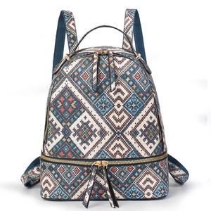 Ethnic bohemian geometric pattern backpack with blue straps and golden metal zippers