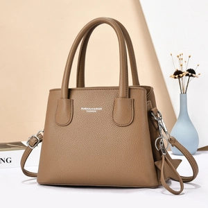 Brown litchi grain leather tote bag for women with top handles and adjustable shoulder strap
