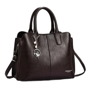 Litchi pattern leather handbag in dark brown with pearl ballerina charm and top handles