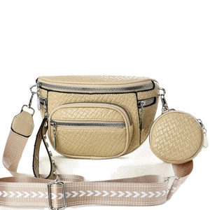 Beige faux leather crossbody bag with geometric strap and round coin purse accessory