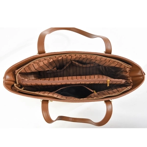 Interior view of brown leather tote showing striped lining and multi-pocket organization