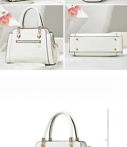 Detailed close-up of a white tote bag featuring vertical textures and gold metal accents