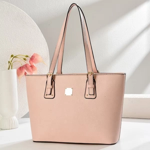 Pink lychee grain leather tote bag with gold hardware for professional commuting