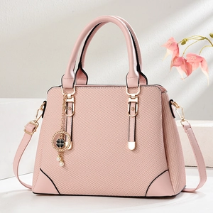 Pink large capacity handbag with woven texture and a clover pearl charm for women