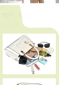 Macro shot showing internal compartments and large storage capacity of the beige handbag