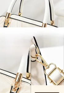 Detail of white tote bag with golden hardware and textured wave pattern stitching