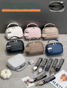 Close-up of small crossbody round bag in various colors with patterned wide straps