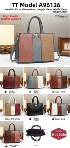 Detail view of large capacity tote bag with contrast colors and metal B buckle