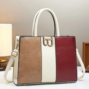 Three-color patchwork tote bag with gold B-buckle, includes handles and adjustable strap