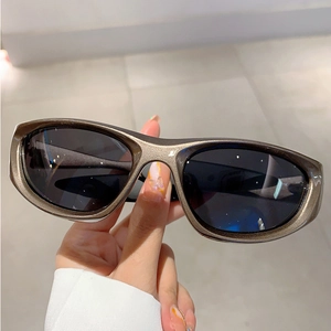 Y2K sporty champagne gold wraparound sunglasses with dark lenses for outdoor cycling