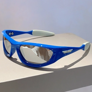 Detail of electric blue sports sunglasses with silver mirrored lenses and non-slip pads
