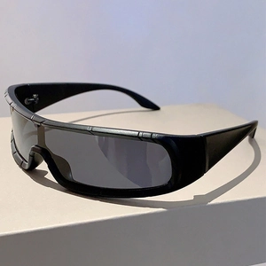 Detail view of matte black wraparound sunglasses with industrial anti-slip texture