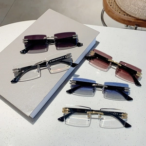 Frameless square metal sunglasses in multiple colors with gold temples and UV protection