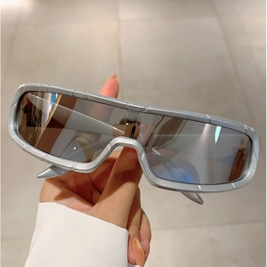 Futuristic silver sports sunglasses with wraparound shield lens and punk tech design