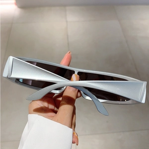 Futuristic silver wrap-around sunglasses with geometric frame and dark lenses