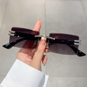Fashionable rimless rectangular sunglasses with purple gradient lenses and silver metal frame