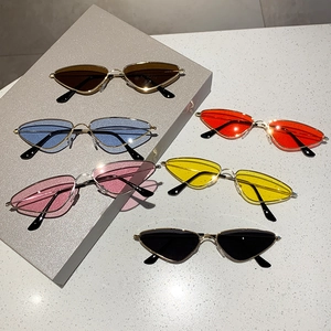 Detailed view of six colorful cat-eye sunglasses with slim gold metal frames and tips