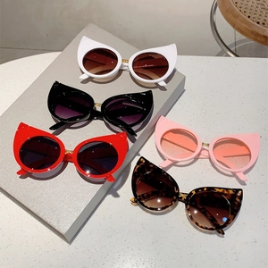 Cat eye sunglasses detail in black, white, red, pink, and leopard print frames